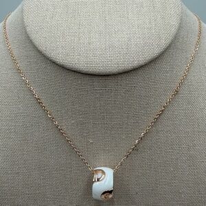 Elegant Gold and White Pendant Necklace